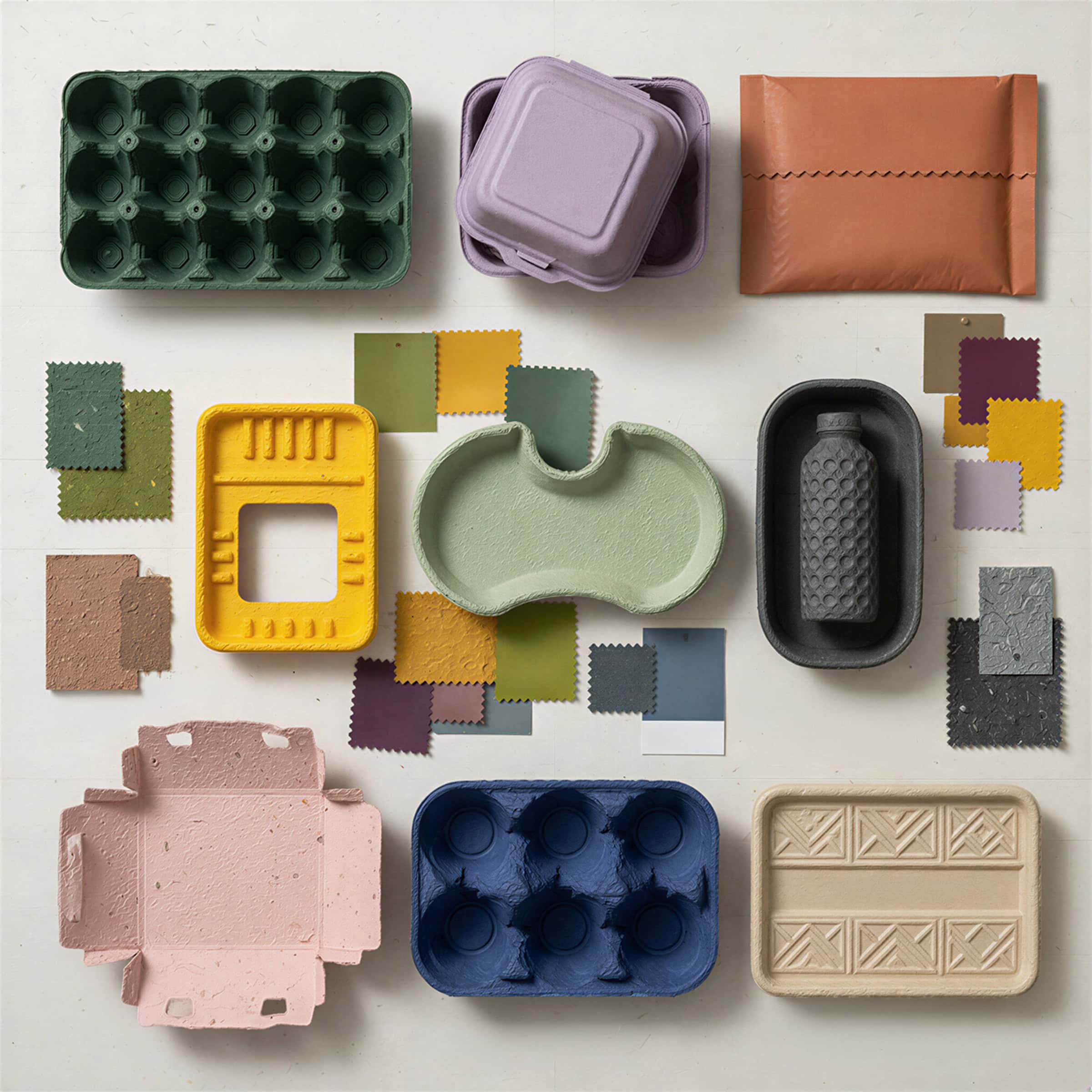 Several types of materials showing the different fiber options available for packaging including egg crates, carry out boxes, and luxury good packaging.